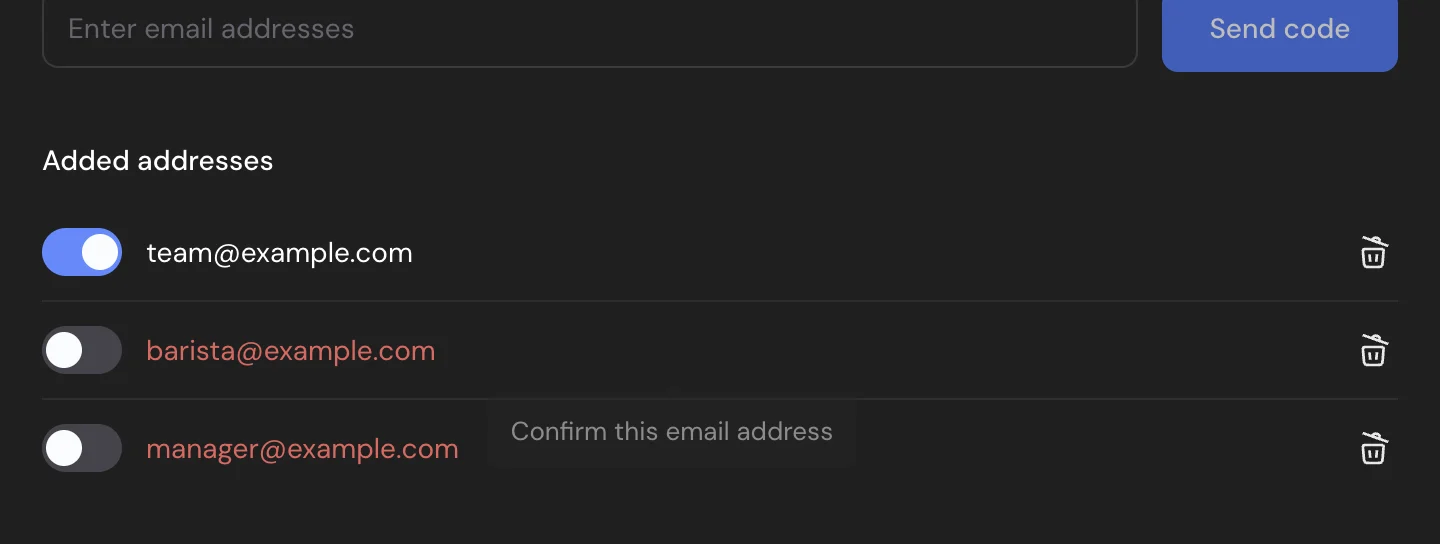Added addresses: a confirmed address switched on and two unconfirmed addresses in red, one with the Confirm this email address tooltip